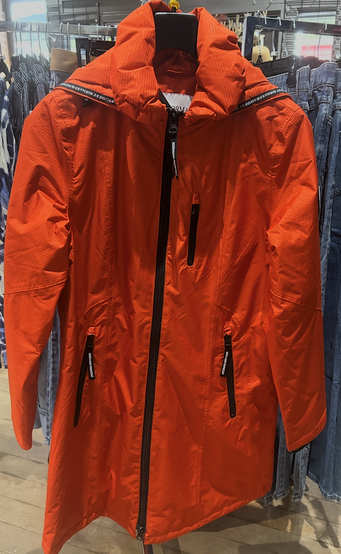 Normann women's bright orange hooded windbreaker rain jacket at Beyond Gifts store Revelstoke BC